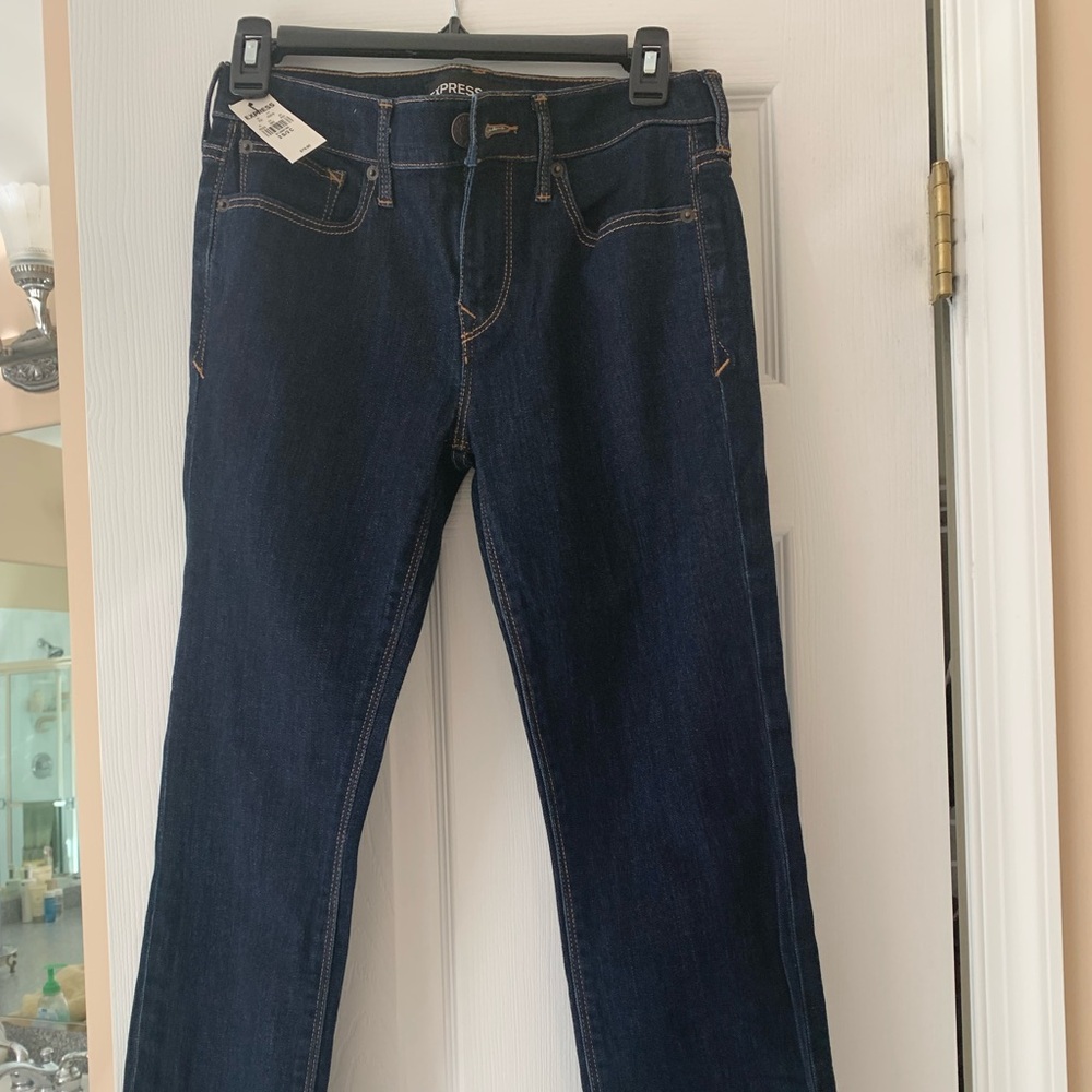 Express size 2 mid rise jeans . New with tags